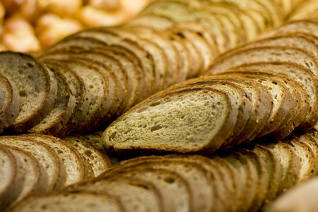 An array of sliced bread on a meal buffet 