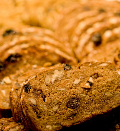 Fresh sliced bread with whole grains and dried fruit
