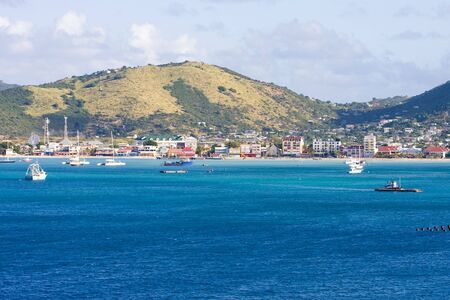 A blue tropical bay filed with boats and yachtsの写真素材