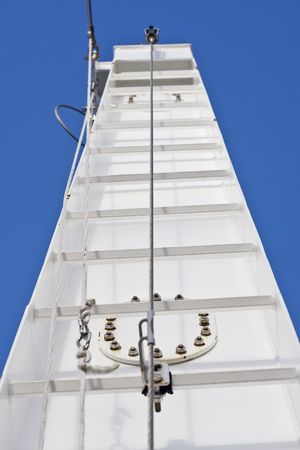 White Towers on a large cruise ship with ladders and cables の写真素材