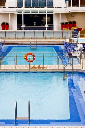 A nice swimming pool on the deck of a luxury swimming poolの写真素材
