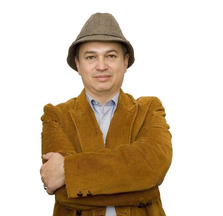 A nice looking middle-aged hispanic man on a white background wearing a hatの写真素材