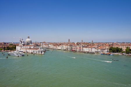 Canals and church domes in Venice Italyの写真素材