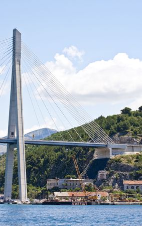 A bridge support on the coast of Dubrovnik, Croatia with construction underneathの写真素材
