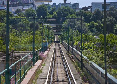 Tracks on the funicular in Capri, Italy down the hillの写真素材