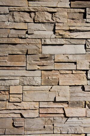 A wall of cut and stacked stone great for backgrounds or textureの写真素材