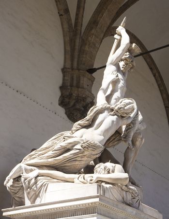 A statue in a plaza in Florence Italyの写真素材