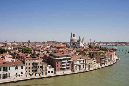 The canals and lagoon in venice italy with churches and old buildingsの写真素材
