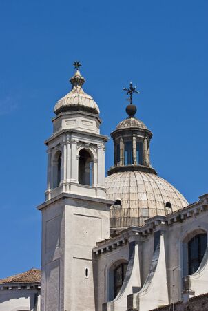 A view of an iconic old church on the Grand Canal in Venice, Italyの写真素材