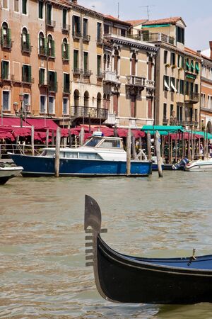 A view of old buildings along the canals of Venice Italyの写真素材