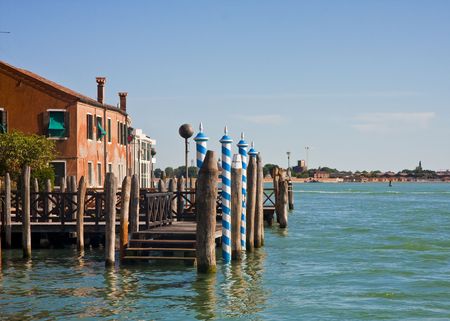 A traditional Venice boat dock on the island of Muranoの写真素材