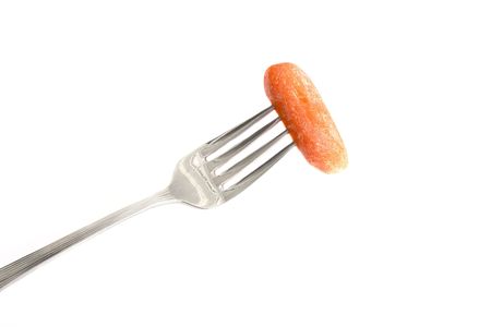 Carrot on a forkの写真素材
