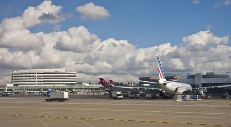 Commercial airplanes at a major international airportの写真素材