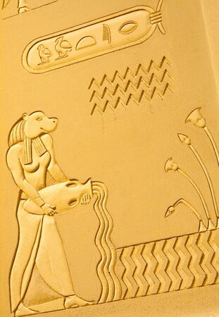 A wall showing egyptian carvingsの写真素材