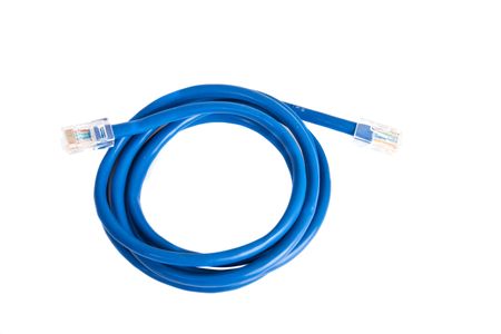 A coil of blue network cable on a white backgroundの写真素材