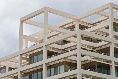 A white office  building on a cloudy winter dayの写真素材