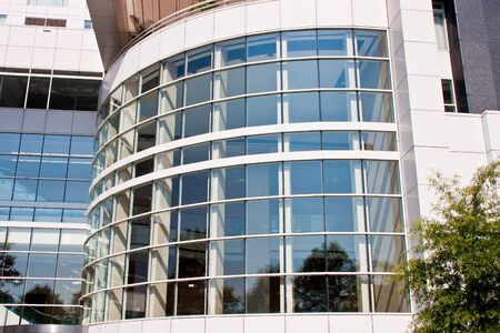 A modern curved office building lobbyの写真素材