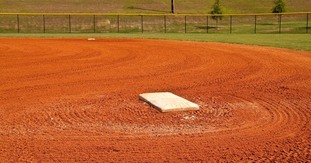 First base in the baseline of a baseball fieldの写真素材