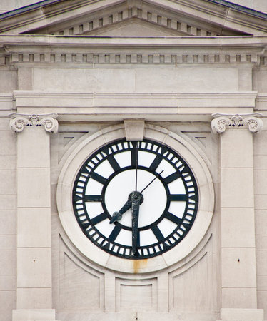 Seven Thirty on an old courthouse clockの写真素材