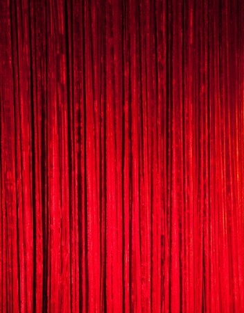Red curtains on a stage for background or textureの写真素材