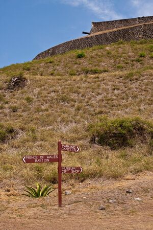 A sign in a park by a old hilltop fortの写真素材