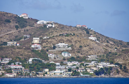 White vacation homes on a tropical hillside