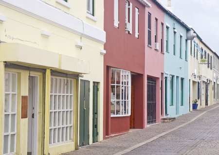 Shops along a street on Bermuda of many different colorsの写真素材