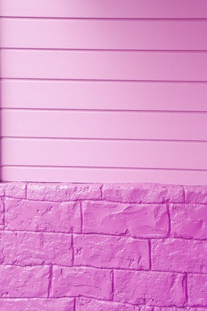 A wood and brick wall painted purple for background or textureの写真素材