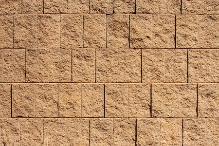 A brown block retaining wall for backgrounds or texturesの写真素材