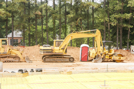Heavy earth moving equipment at a new construction site