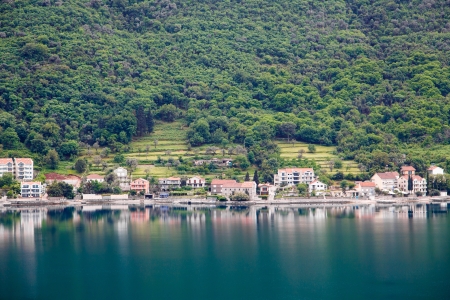 Houses and condos on the coast of Montenegro near Kotorの写真素材