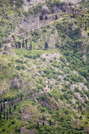 Steep paths up Montenegro mountain with chapels at rest pointsの写真素材