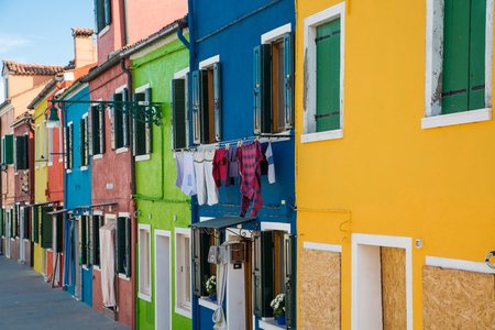 Colorful homes along the streets of Buranoの写真素材
