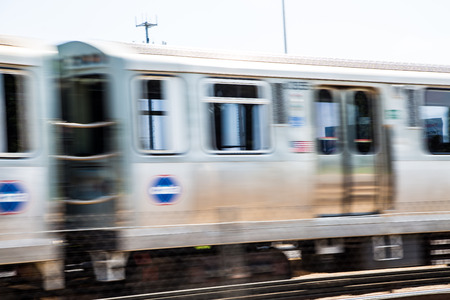 A speeding commuter train in Chicagoの写真素材