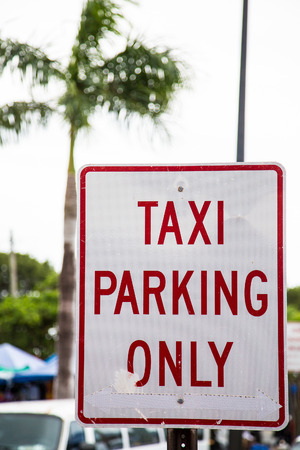 Old sign in tropics, Taxi Parking Onlyの写真素材