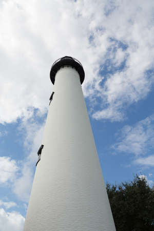 An old white brick lighthouseの写真素材