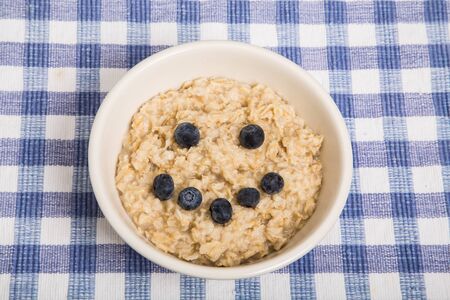 A bowl of hot, fresh cooked oatmealの写真素材