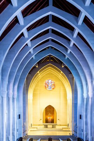 View toward the altar in a church with arched ceilingの写真素材