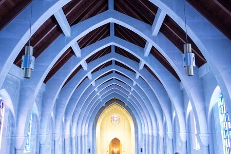View toward the altar in a church with arched ceilingの写真素材