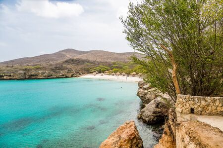 Clear aqua water off the rocky coast of Curacaoの写真素材