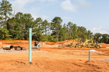 Heavy equipment in graded new residential construction siteの写真素材