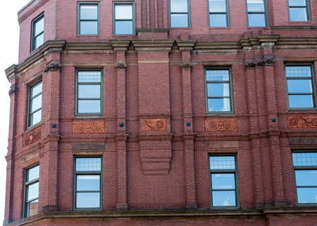 Ornate Inserts in Old Brickwork on Portland Buildingの写真素材