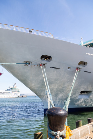 Black Bollard with Ropes to Cruise Ship in Portlandの写真素材