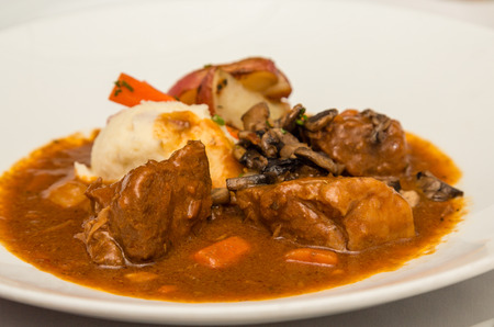 Lamb Shank in Gravy with Vegetablesの写真素材
