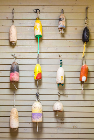 Colorful Lobster Floats on Wood Wall