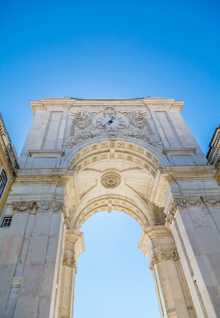 White Arch in Lisbon Plaza with Clockの写真素材