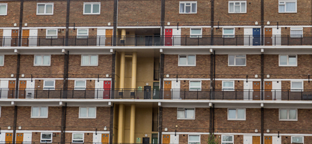 Mostly White Doors on Old Apartment Buildingの写真素材