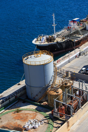 New Fuel Tank by Old Tanker in Gibralterの写真素材