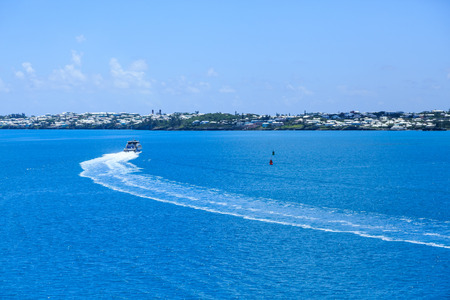 Ferry Curving Toward Coast of Bermudaの写真素材