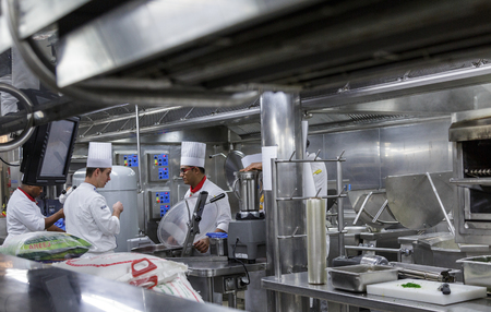 MIAMI, FLORIDA - December 21, 2015: Kitchen staff on cruise ships, including chefs and cooks, work some of the hardest and longest hours as the kitchens are in operation 24 hours a day.のeditorial素材